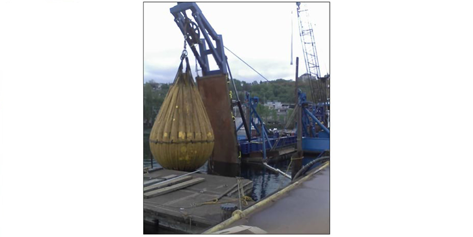 The crane was field tested using a large water filled bag.  It passed with no problems and is now in service somewhere around the world.